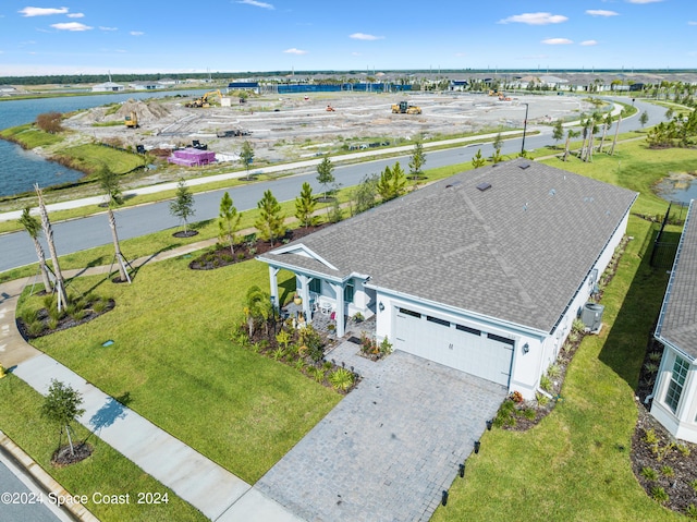 drone / aerial view featuring a water view
