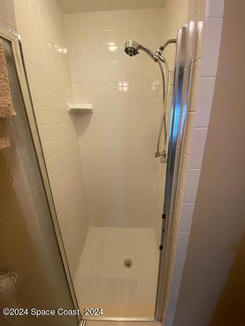 bathroom with an enclosed shower