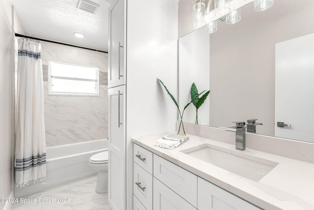 full bathroom with toilet, vanity, shower / tub combo with curtain, and a textured ceiling