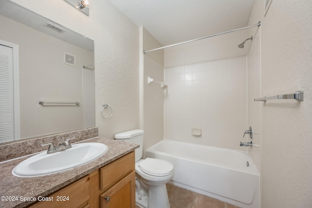 full bathroom with vanity, a textured ceiling, shower / tub combination, toilet, and tile patterned floors