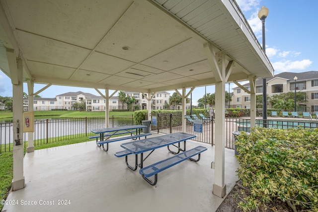 view of patio / terrace featuring a water view