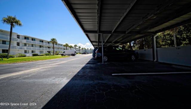 view of car parking with a carport