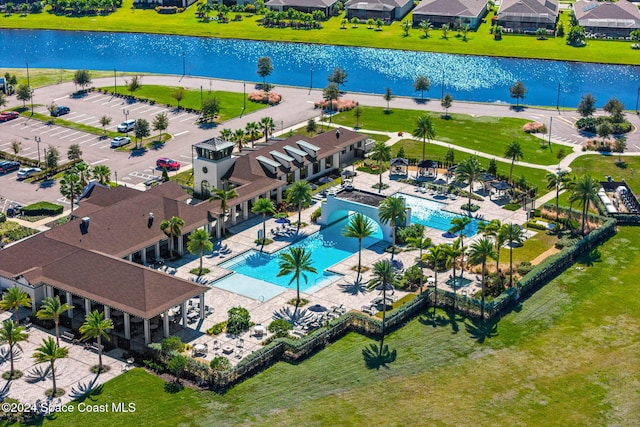 birds eye view of property featuring a water view