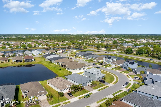 aerial view featuring a water view