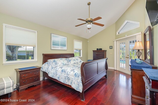 bedroom with access to outside, dark wood-type flooring, multiple windows, and ceiling fan