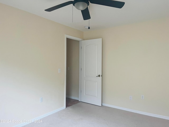 unfurnished room featuring ceiling fan