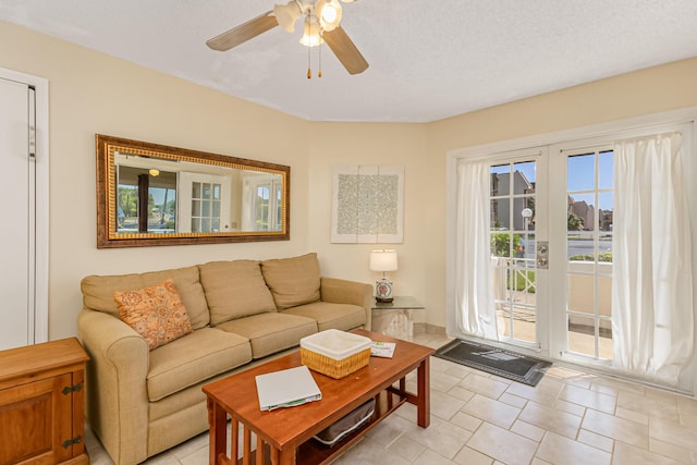 living room featuring ceiling fan