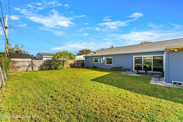 view of yard with a patio area