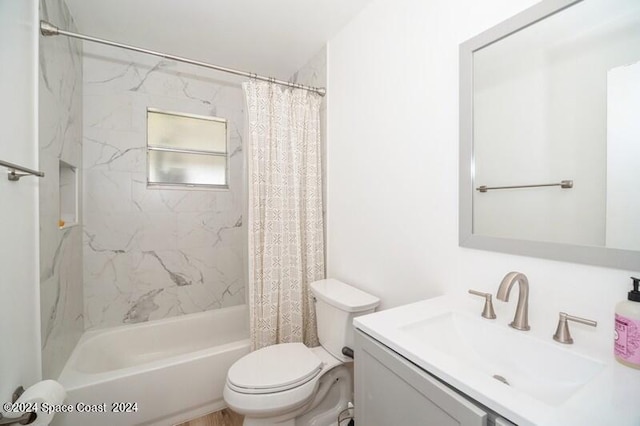 full bathroom with vanity, toilet, and shower / bath combo with shower curtain