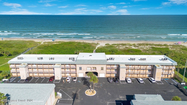 aerial view with a view of the beach and a water view