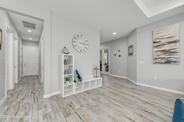 hallway featuring light wood-type flooring