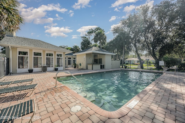 view of swimming pool featuring a patio