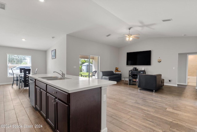 kitchen with ceiling fan, sink, stainless steel dishwasher, a kitchen island with sink, and light hardwood / wood-style floors