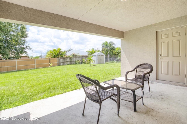 view of patio / terrace with a storage unit