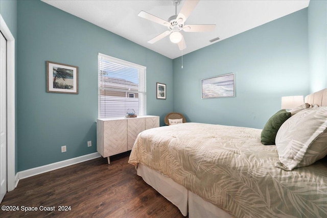 bedroom featuring ceiling fan and dark hardwood / wood-style floors