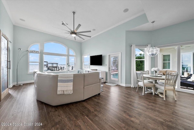 living room with ceiling fan, high vaulted ceiling, crown molding, and dark hardwood / wood-style floors