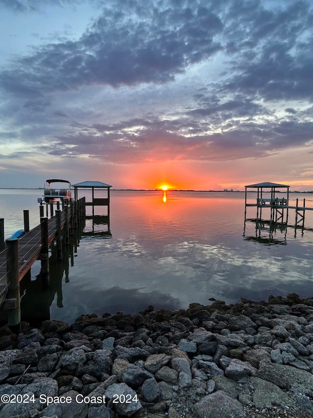 dock area featuring a water view