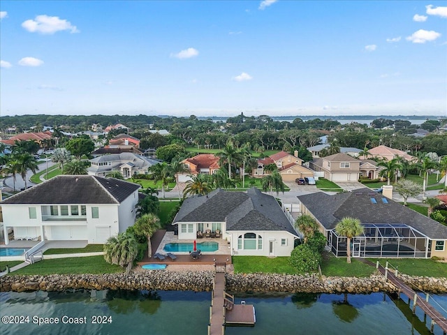 bird's eye view with a water view