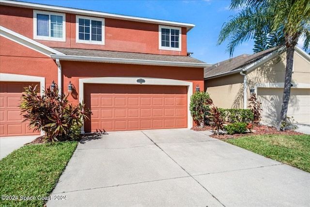 view of front of home with a garage