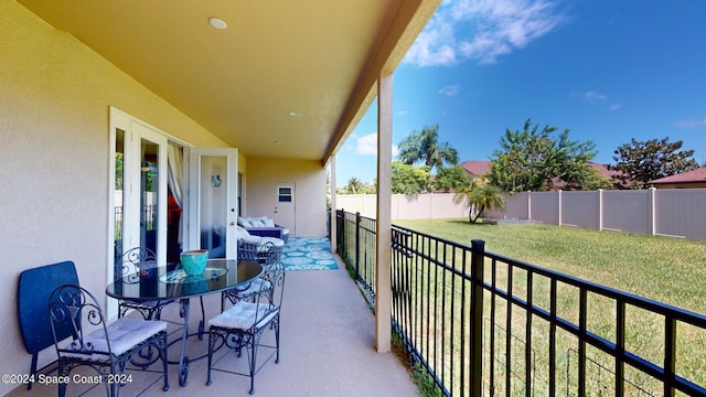 balcony featuring a patio area