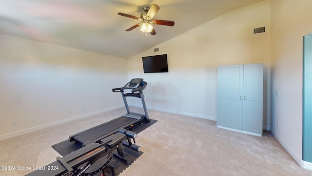 workout room with light carpet, vaulted ceiling, and ceiling fan