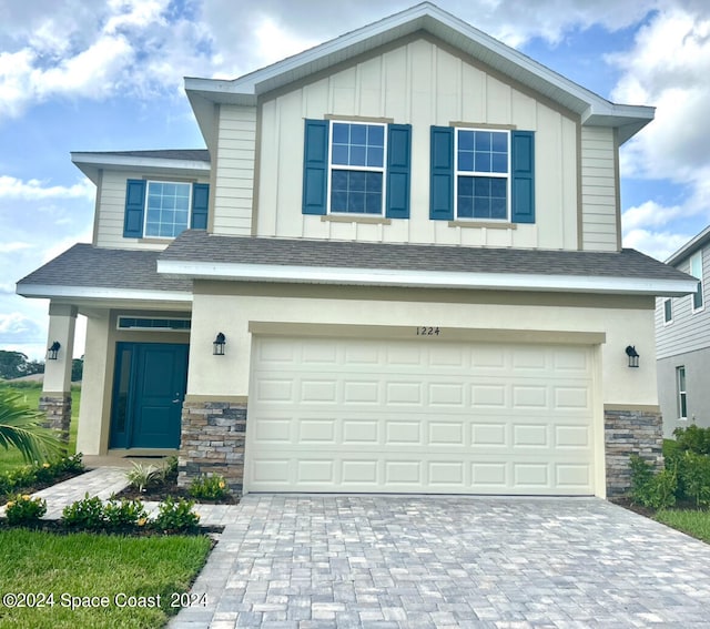 view of front of home featuring a garage