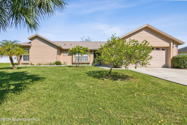 ranch-style house with a garage and a front lawn