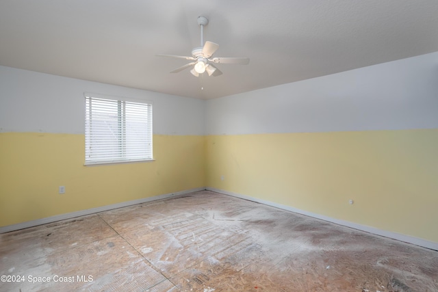 empty room featuring ceiling fan