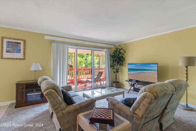 carpeted living room featuring crown molding