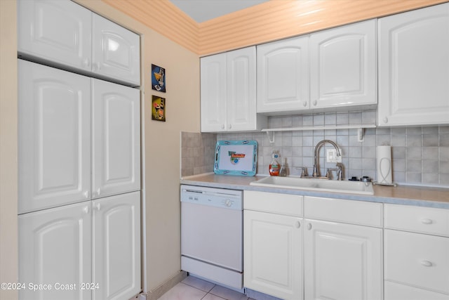 kitchen featuring dishwasher, white cabinetry, and sink