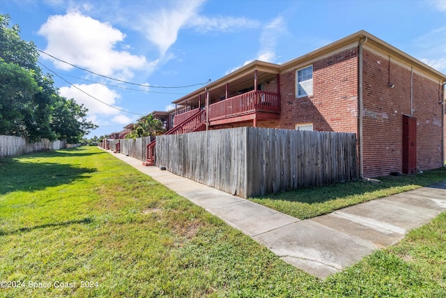 exterior space with a lawn