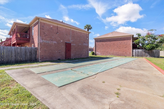 view of pool with a lawn