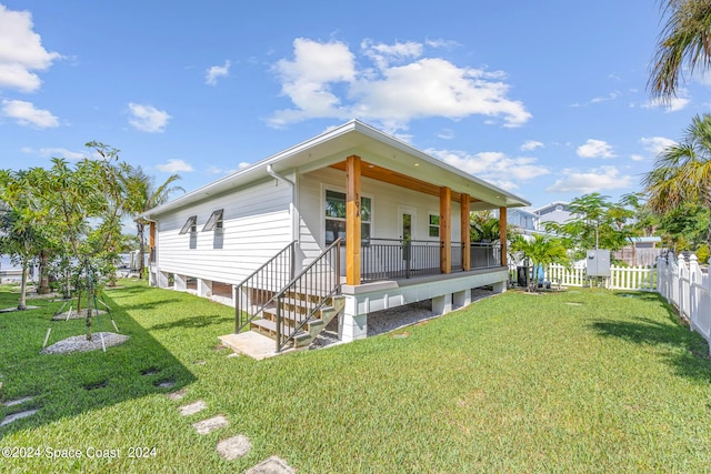 view of front of home with a front yard