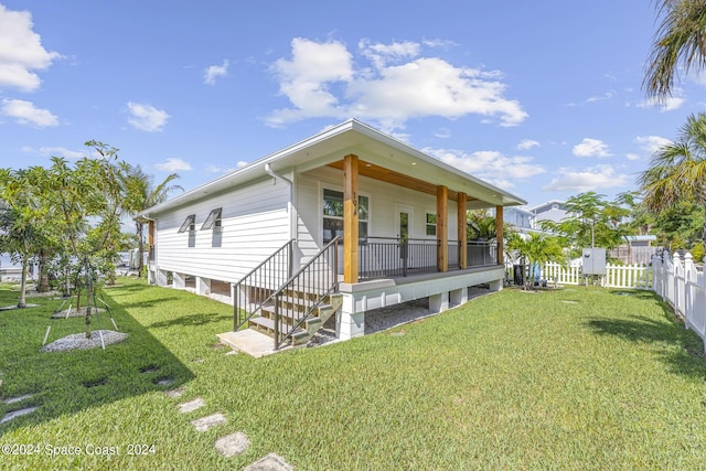 19 Vip Is Unit A, Grant, FL 32949 - view of front of property featuring covered porch
