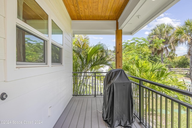 19 Vip Is Unit A, Grant, FL 32949 - wooden deck featuring a grill