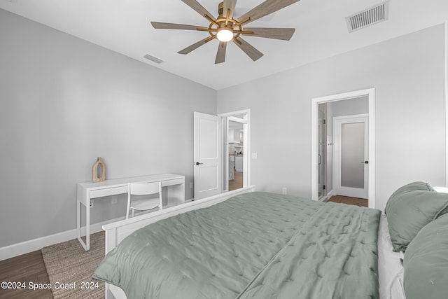 19 Vip Is Unit A, Grant, FL 32949 - bedroom with wood finished floors, baseboards, and a ceiling fan
