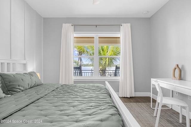 19 Vip Is Unit A, Grant, FL 32949 - bedroom featuring wood finished floors and baseboards
