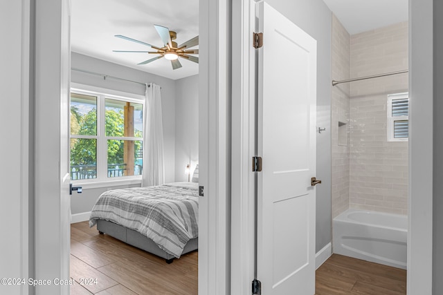 bedroom featuring wood-type flooring and ceiling fan