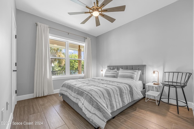 19 Vip Is Unit A, Grant, FL 32949 - bedroom featuring wood-type flooring, baseboards, and ceiling fan