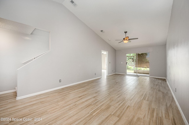 spare room featuring high vaulted ceiling, ceiling fan, and light hardwood / wood-style flooring