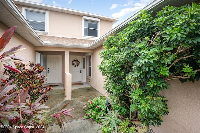 doorway to property featuring a patio