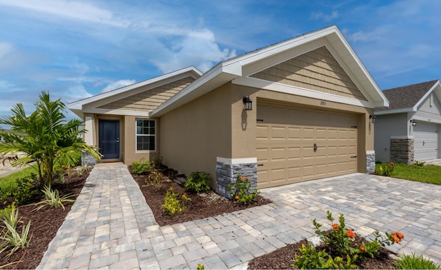 single story home featuring a garage