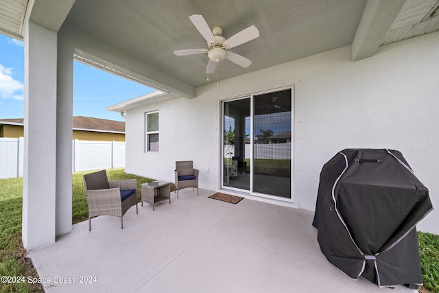 view of patio with ceiling fan