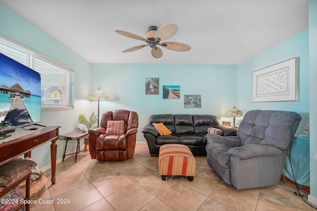 tiled living room featuring ceiling fan