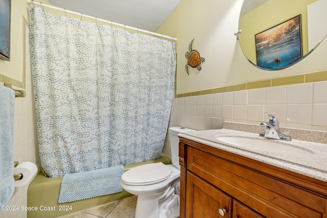 full bathroom with shower / bath combination with curtain, tile patterned floors, vanity, tile walls, and toilet