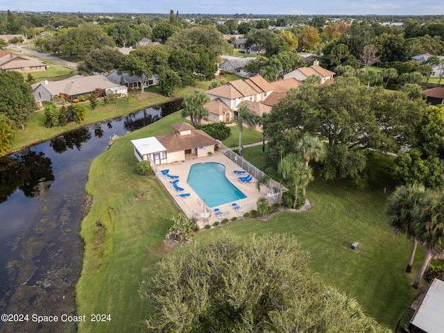 birds eye view of property featuring a water view