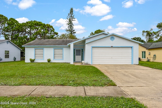 single story home featuring a front yard and a garage