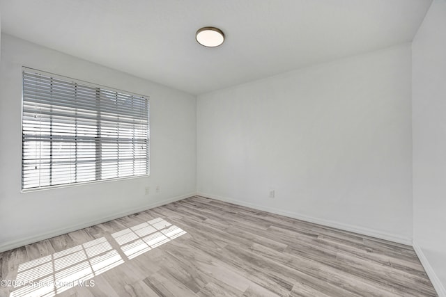 empty room featuring light hardwood / wood-style floors