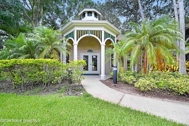 doorway to property featuring french doors