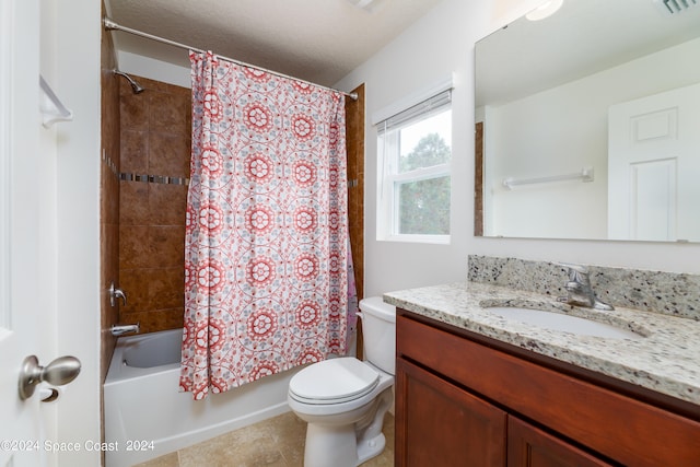 full bathroom with shower / tub combo with curtain, vanity, and toilet